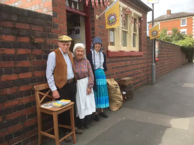 Volunteers in historical costume outside the Stourport Old Ticket Office